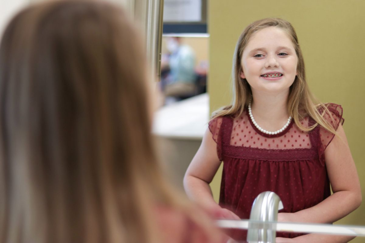 happy patient in moody with braces