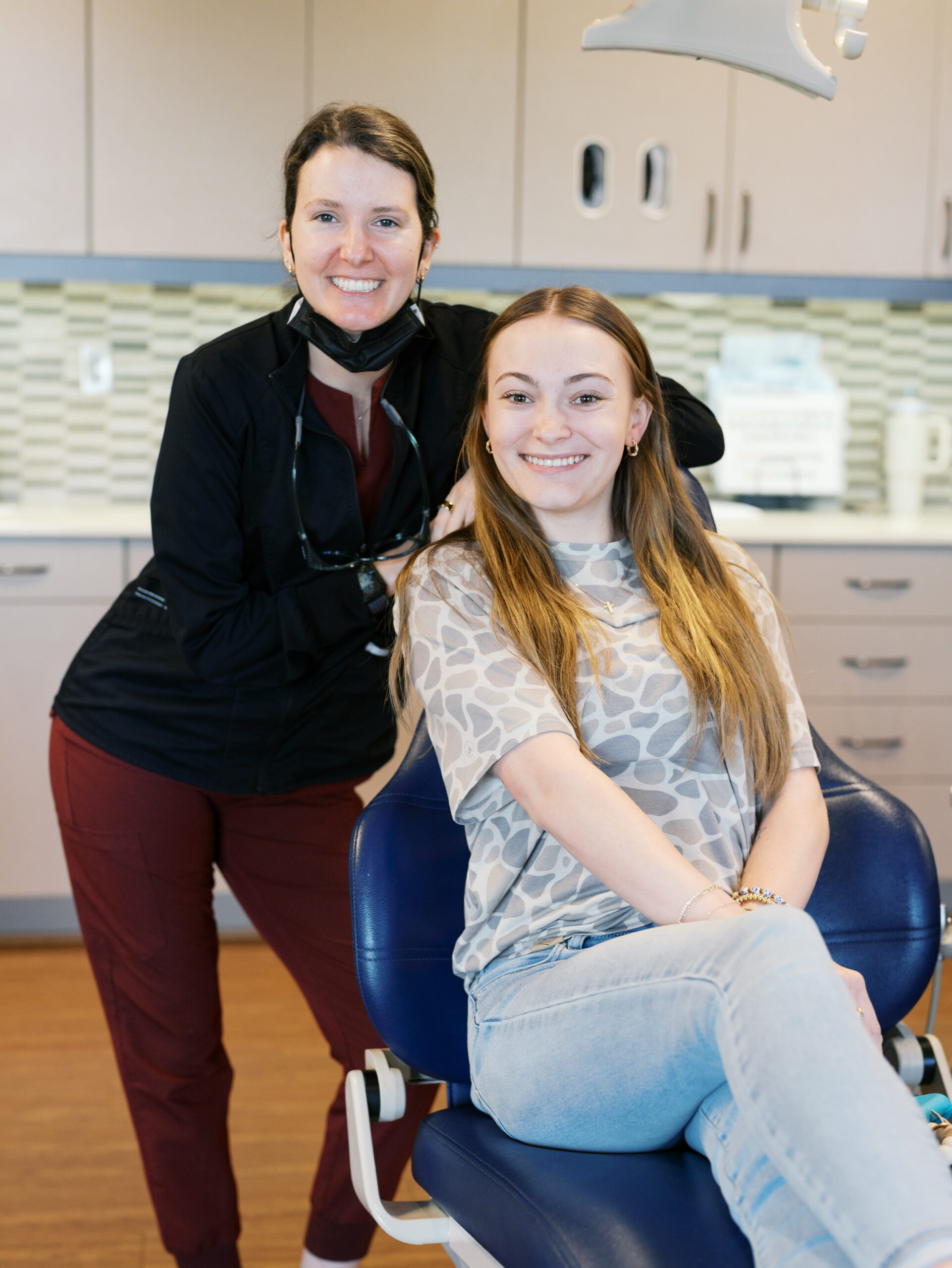 teen patient and team member smiling during visit